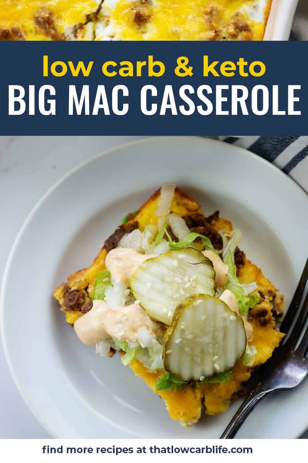 big mac casserole on white plate topped with pickles, sesame seeds, and sauce