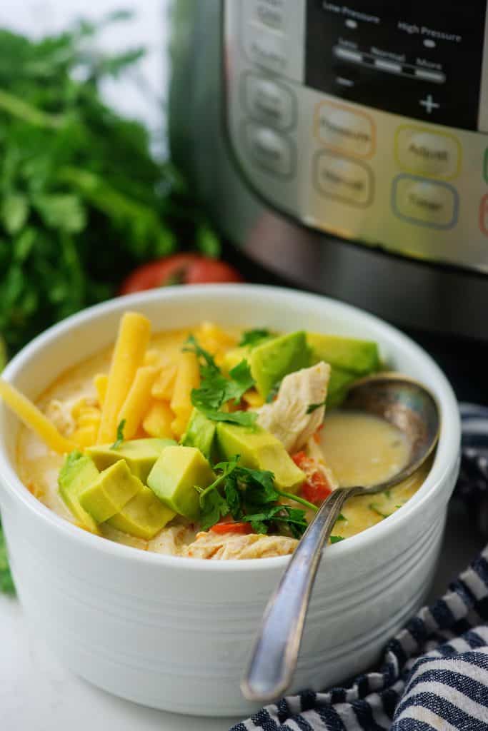 soup in white bowl with Instant Pot in the background