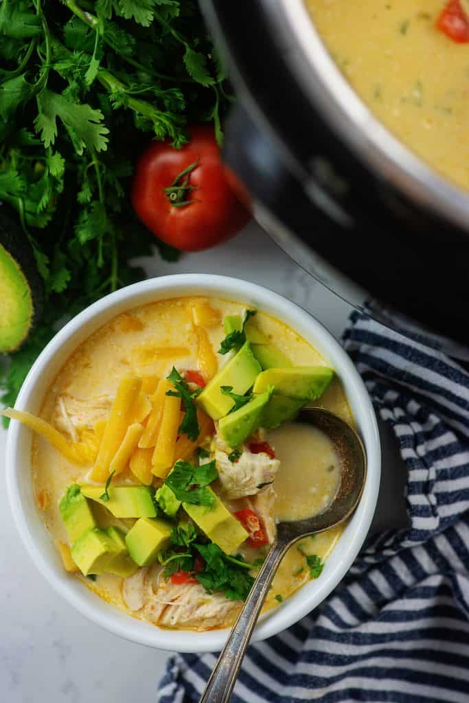 chicken fajita soup in white bowl