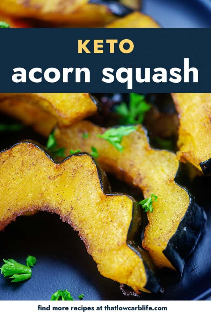 roasted acorn squash on black plate