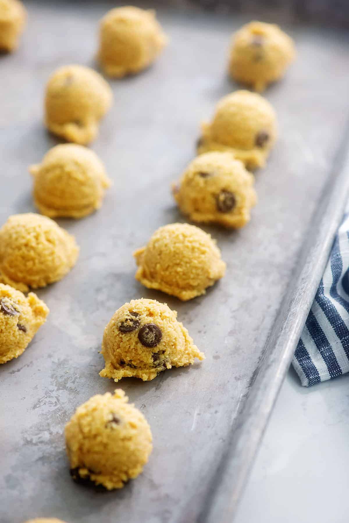 keto cookie dough fat bombs on baking sheet.