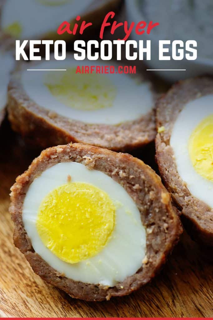 scotch egg on cutting board.