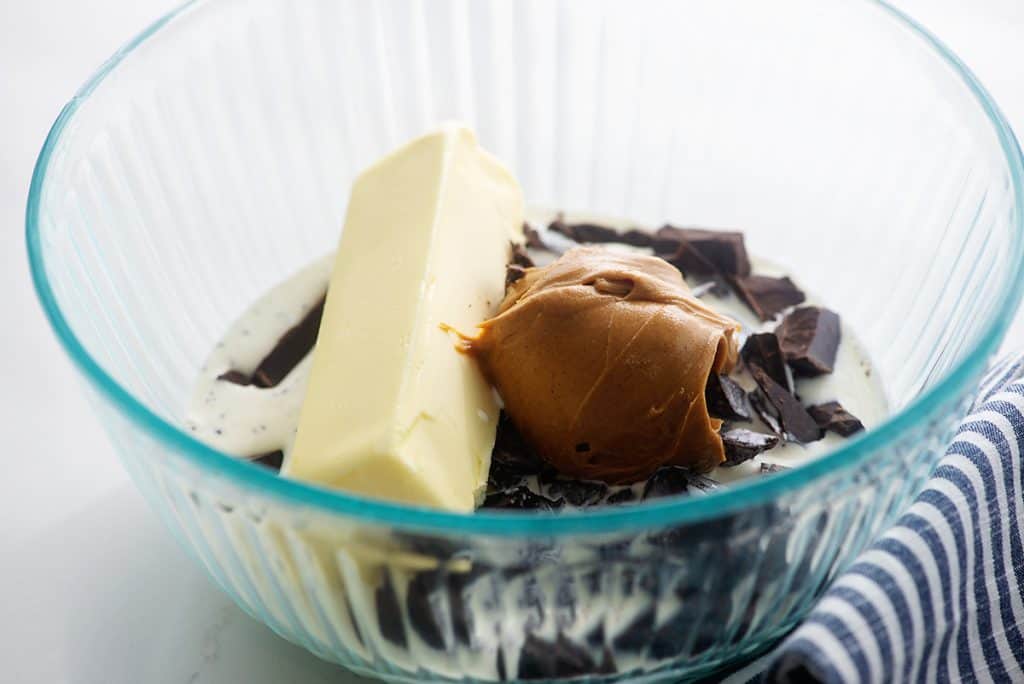 keto fudge ingredients in glass mixing bowl.