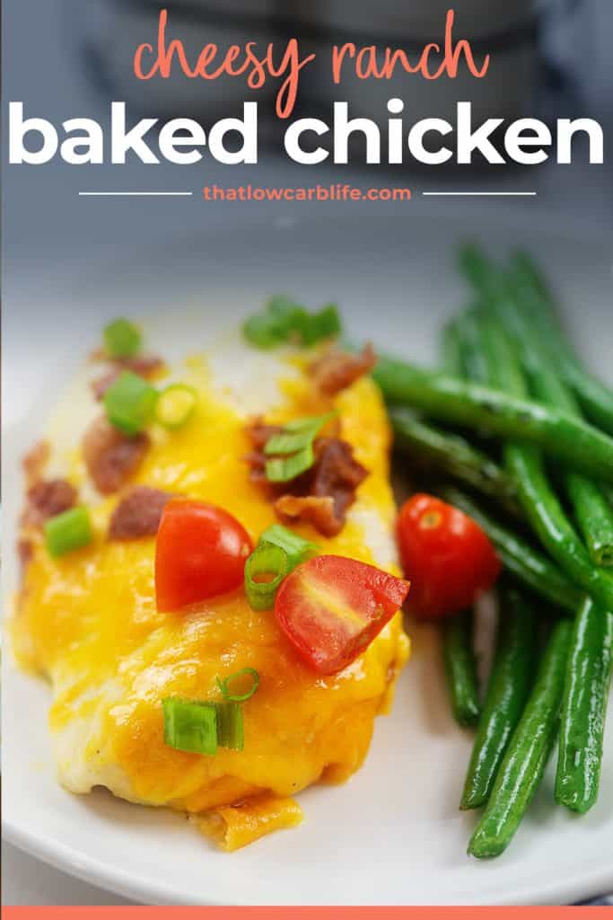 low carb baked chicken on plate with green beans.