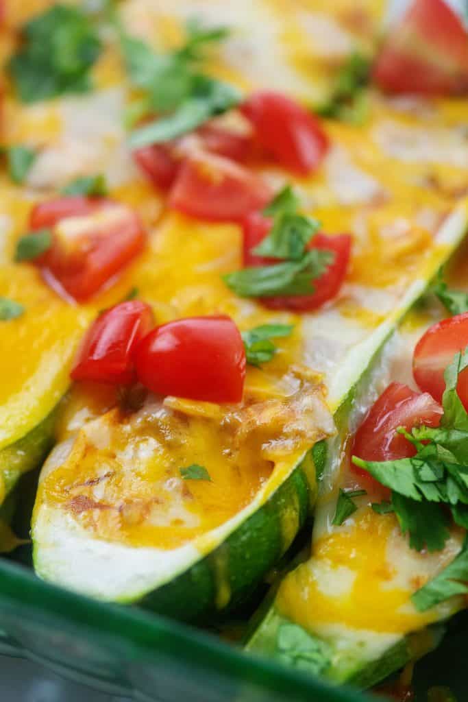 chicken enchilada zucchini boats in glass baking dish.