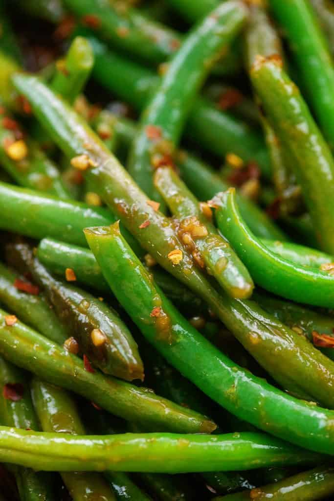 close up of Asian green beans with spices.