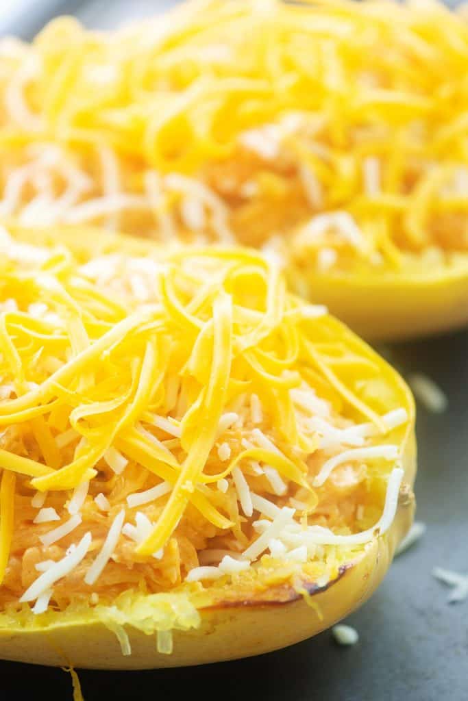 spaghetti squash filled with chicken, hot sauce, and topped with cheese.