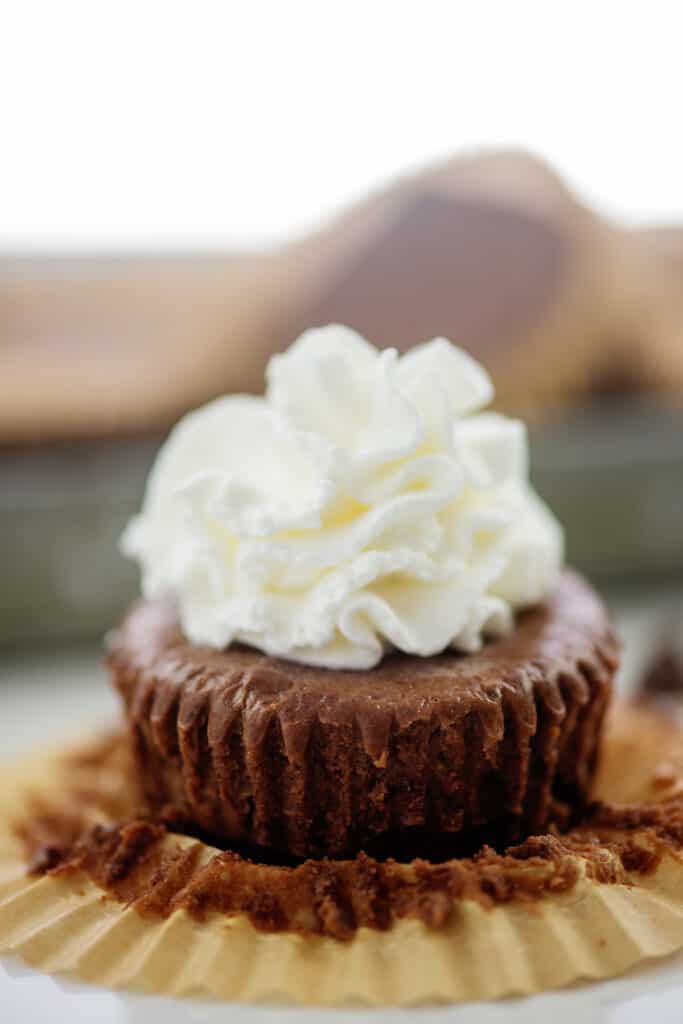 mini keto chocolate cheesecake on muffin paper.