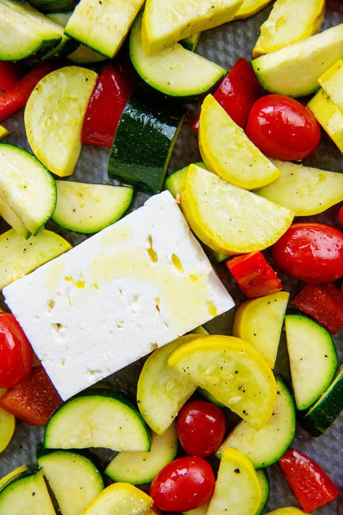 feta and vegetables on sheet pan.