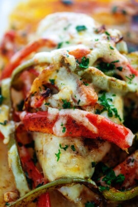 fajita baked chicken with strips of vegetables and cheese.