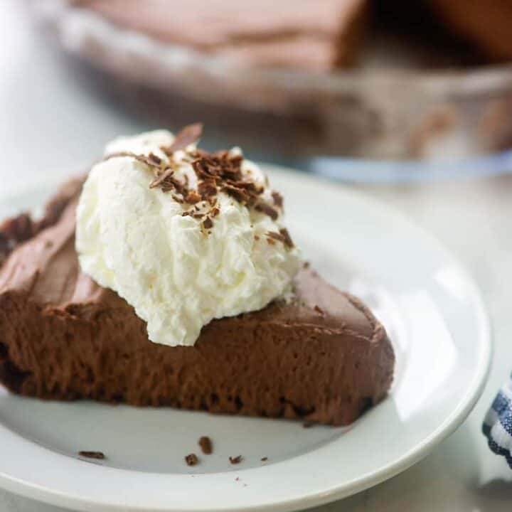 chocolate pie on white plate.