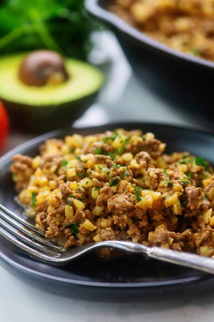 keto Mexican skillet recipe on black plate.