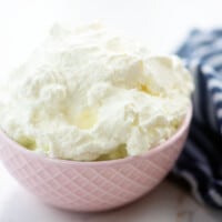 keto whipped cream recipe in pink bowl.