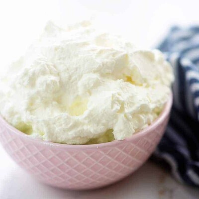 keto whipped cream recipe in pink bowl.