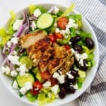 greek salad in white bowl.