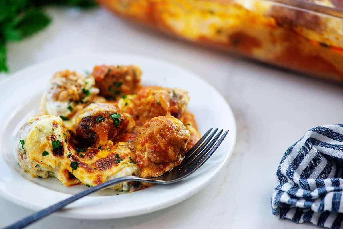 keto meatball casserole on white plate.