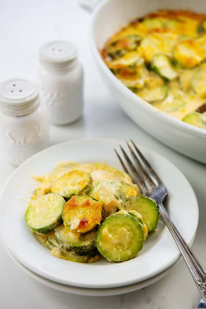 plate with cheesy zucchini.