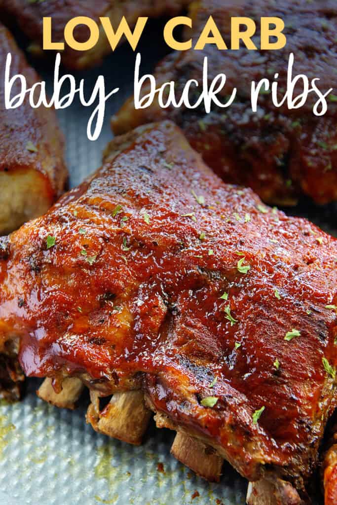 low carb baby back ribs on sheet pan with text for Pinterest.
