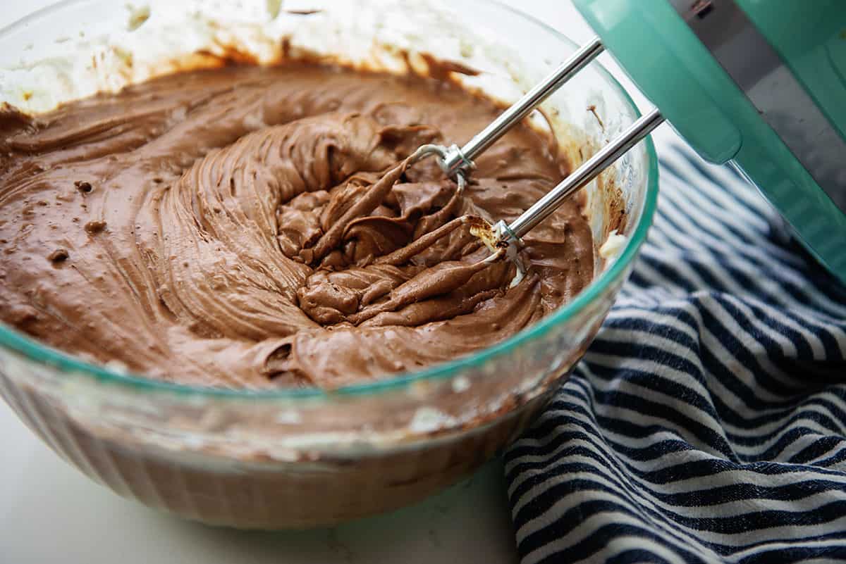 chocolate cheesecake batter in glass bowl.