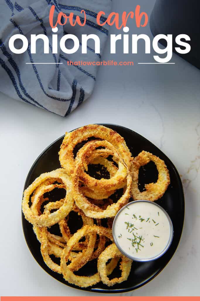 low carb onion rings on plate with ranch.