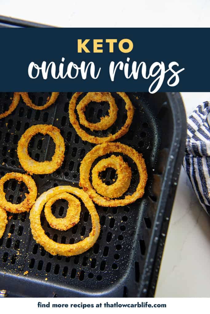 onion rings in air fryer basket.