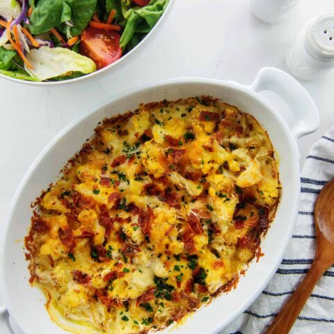 overhead view of cauliflower au gratin in baking dish.