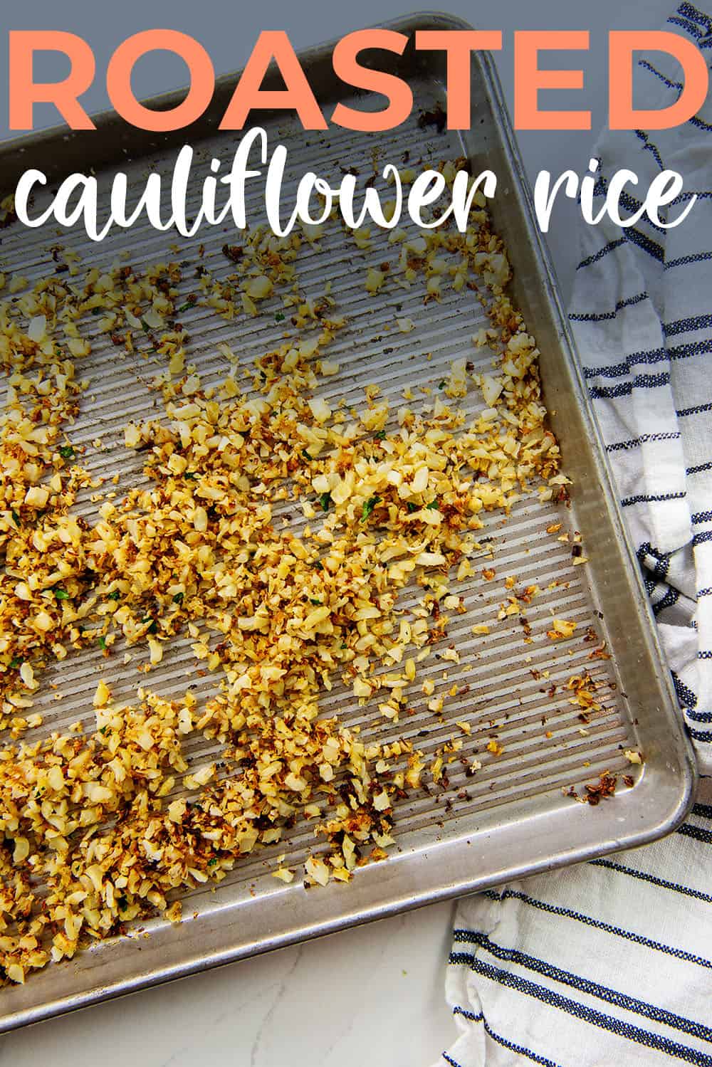roasted cauliflower rice on sheet pan with text for Pinterest.