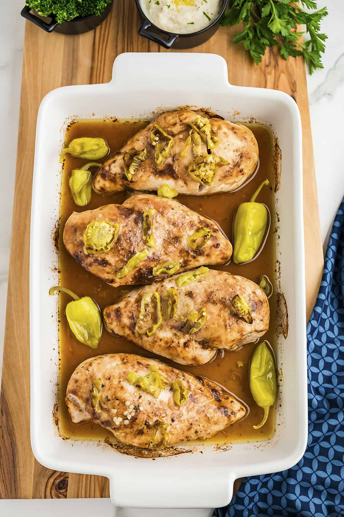 Baked Mississippi chicken in baking dish.