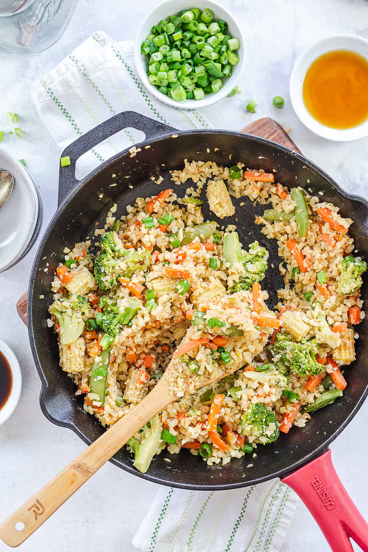 cauliflower stir fry in cast iron skillet.