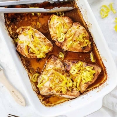 baked mississippi chicken in white dish.