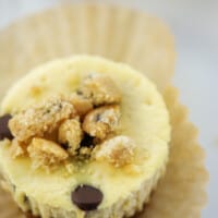 cookie dough cheesecake in brown muffin paper.