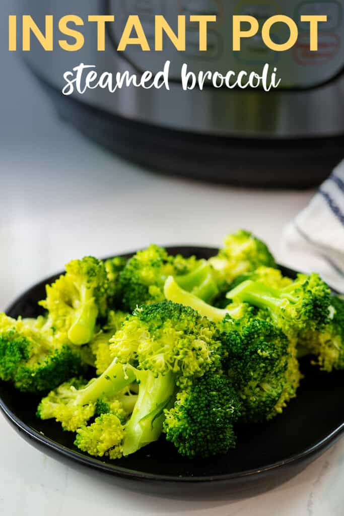 broccoli on black plate with text for Pinterest.
