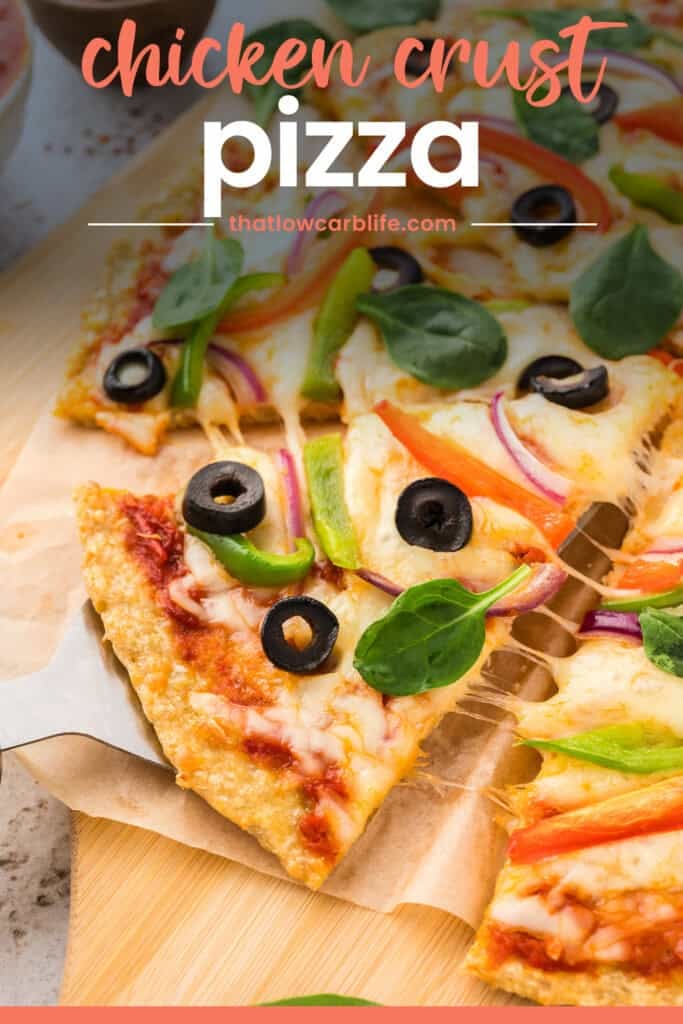 Slice of chicken crust pizza on pizza server.