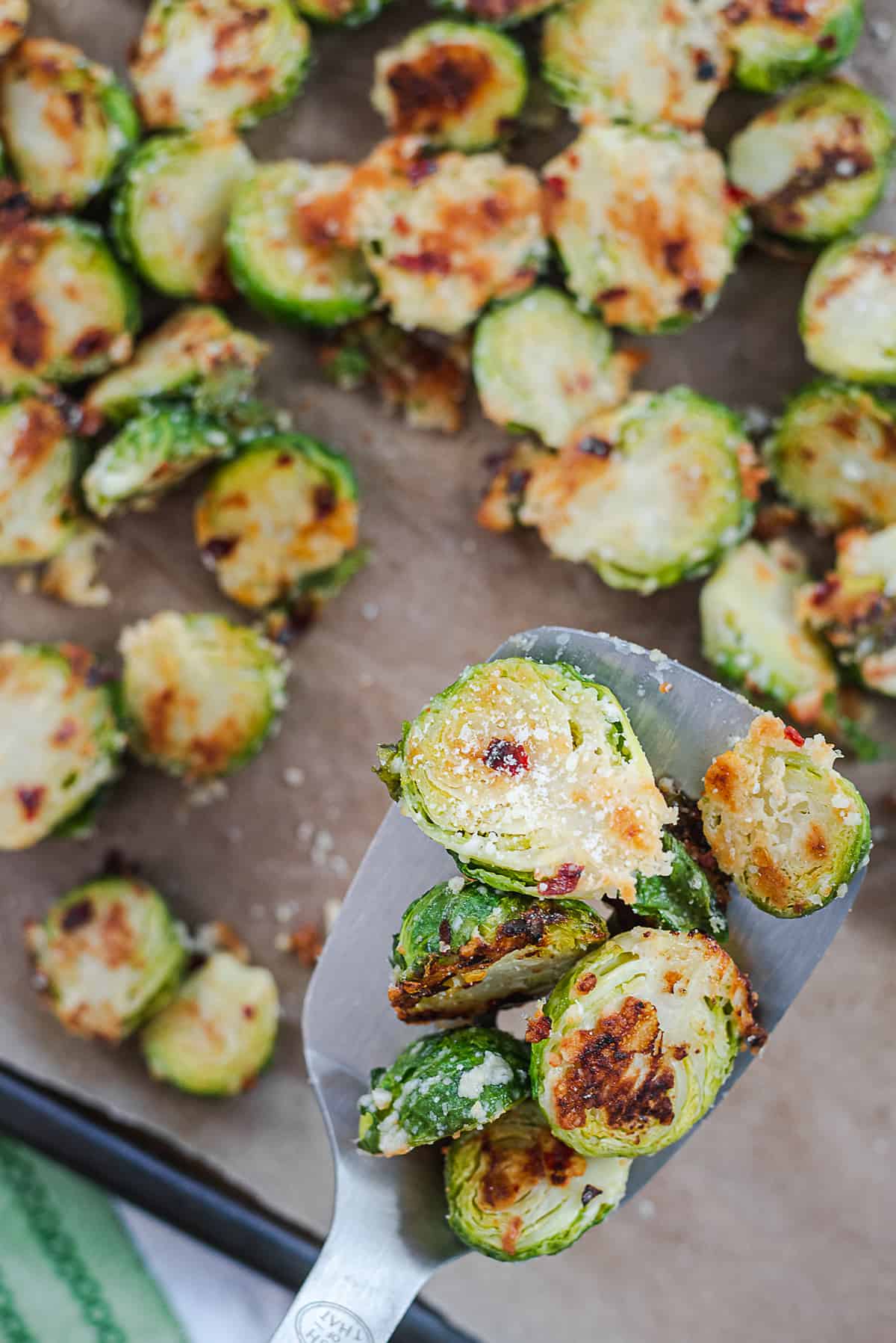 roasted brussel sprouts on spatula.