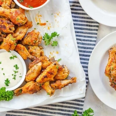 crockpot wings on tray and plate.