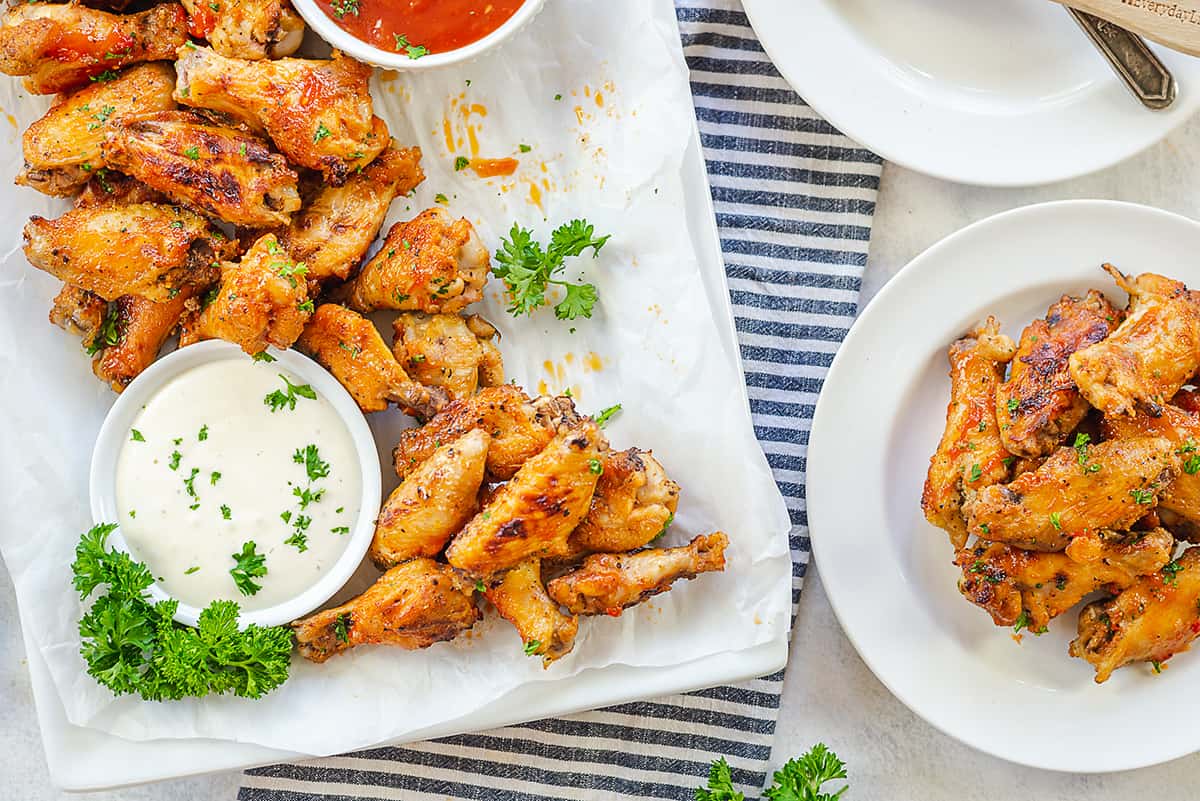 crockpot wings on tray and plate.