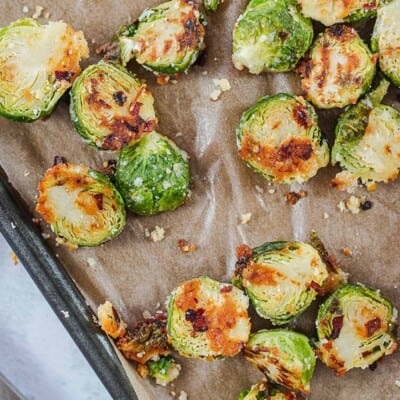 roasted brussels sprouts on parchment paper.