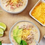 keto taco soup in small bowls with cheese.