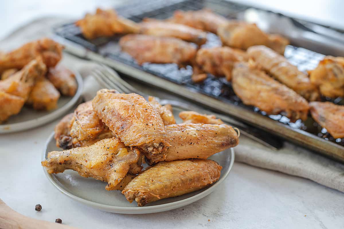 crispy chicken wings on plate.