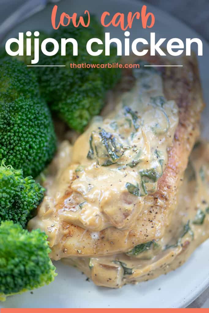 low carb dijon chicken on white plate with broccoli.