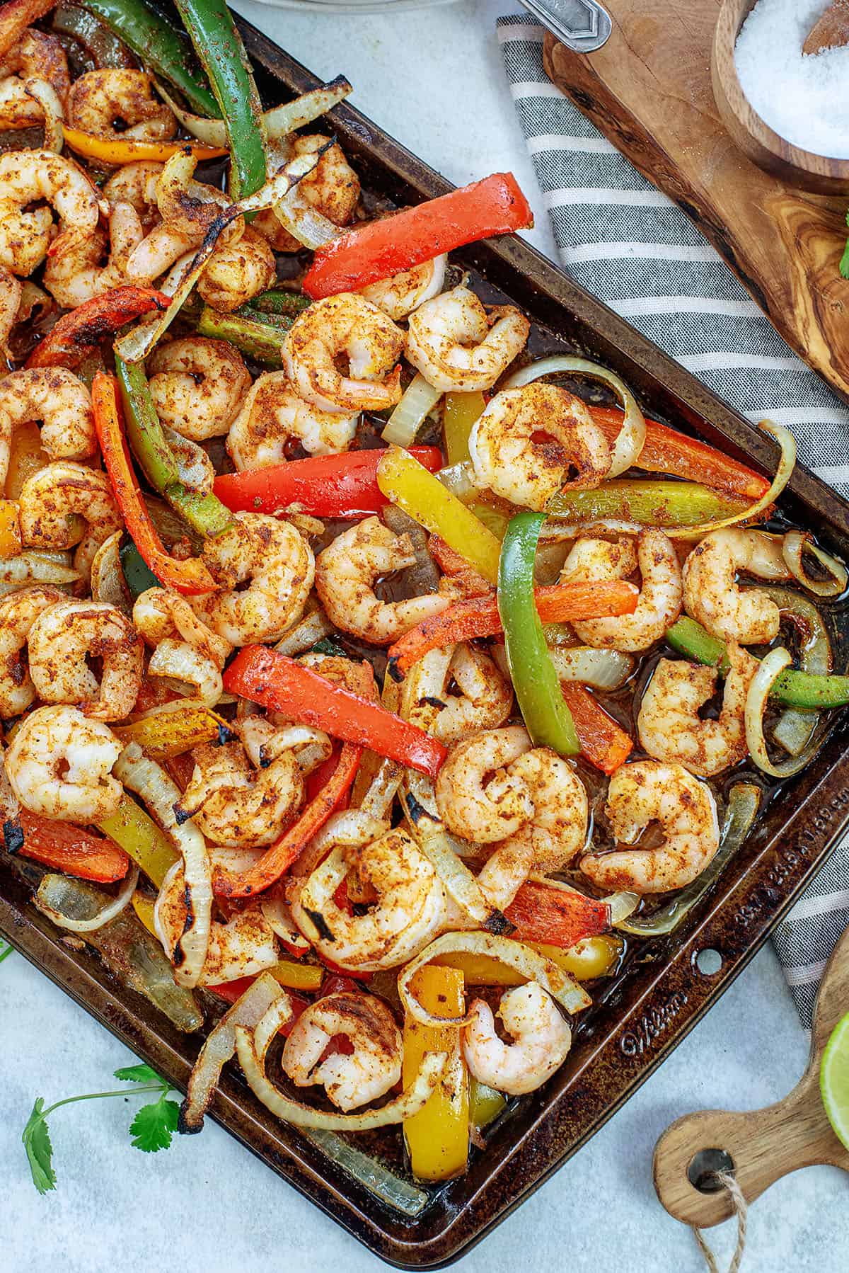 shrimp fajitas on sheet pan.