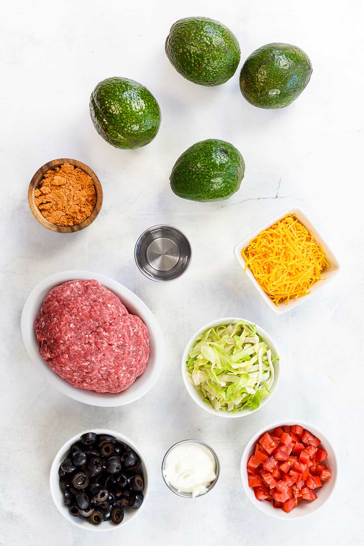 Ingredients for taco stuffed avocados.