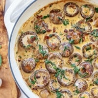 creamy Tuscan mushrooms in white pan.