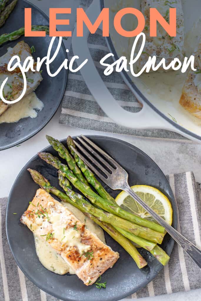 salmon on plate with asparagus.