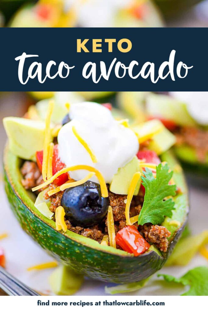 Avocado filled with taco meat and toppings.