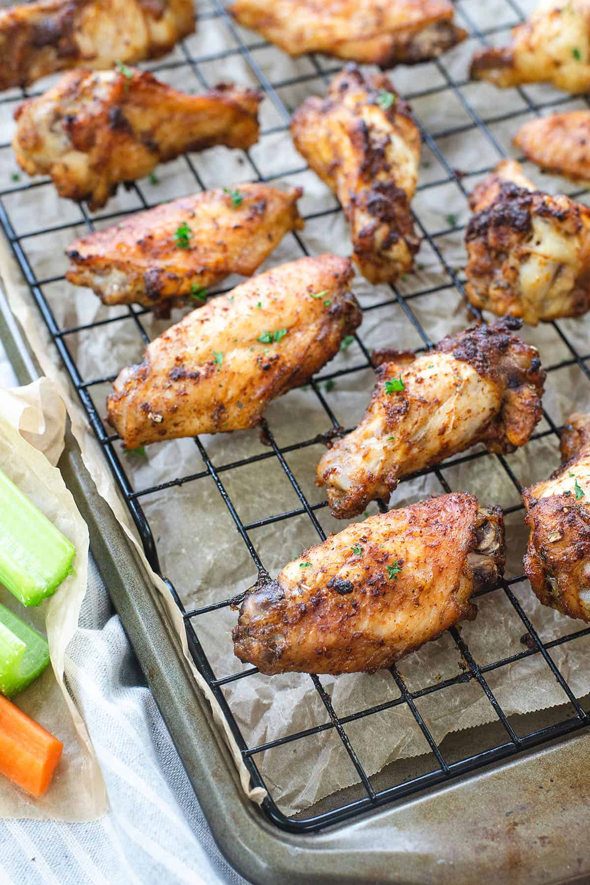 chicken wings on baking rack.