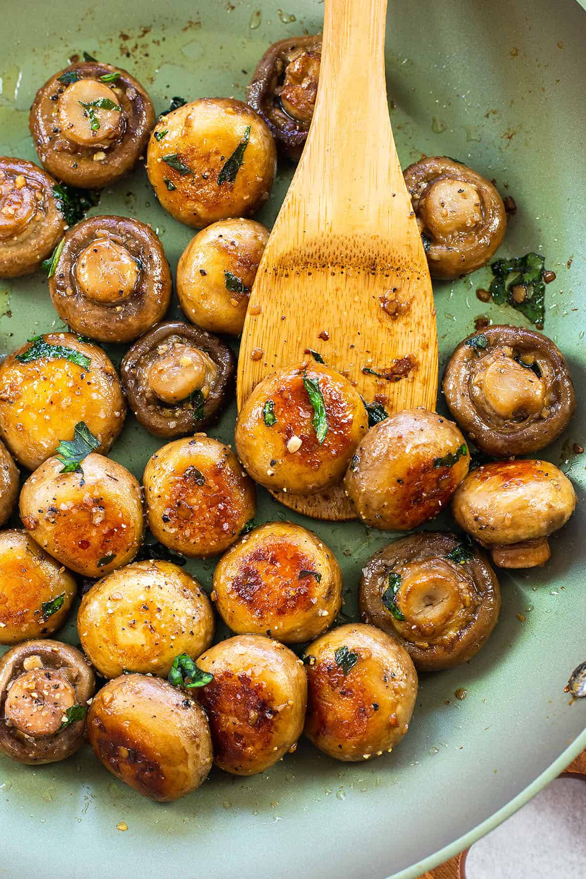 garlic butter mushrooms in skillet.