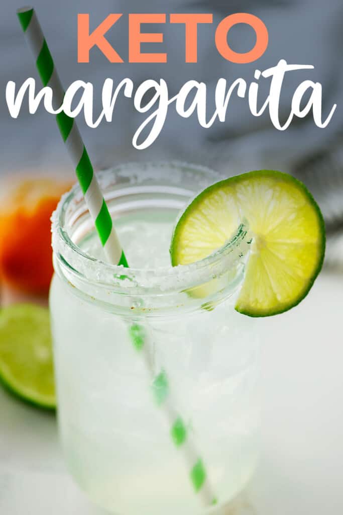 low carb margarita in glass with straw.