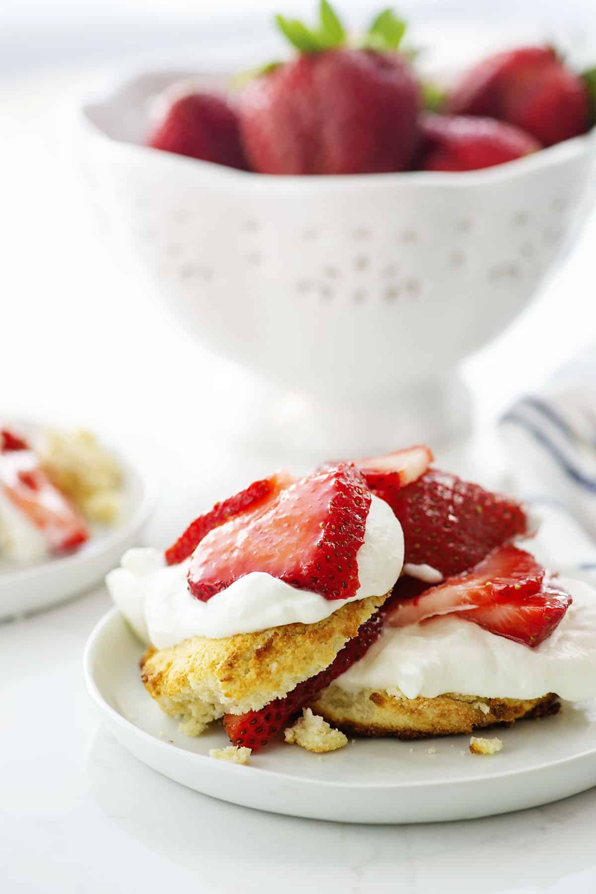 keto strawberry shortcake on white plates.