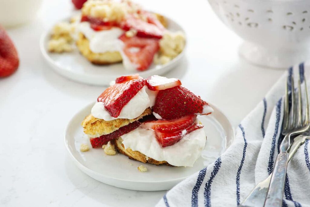 gluten free strawberry shortcake on small plates.